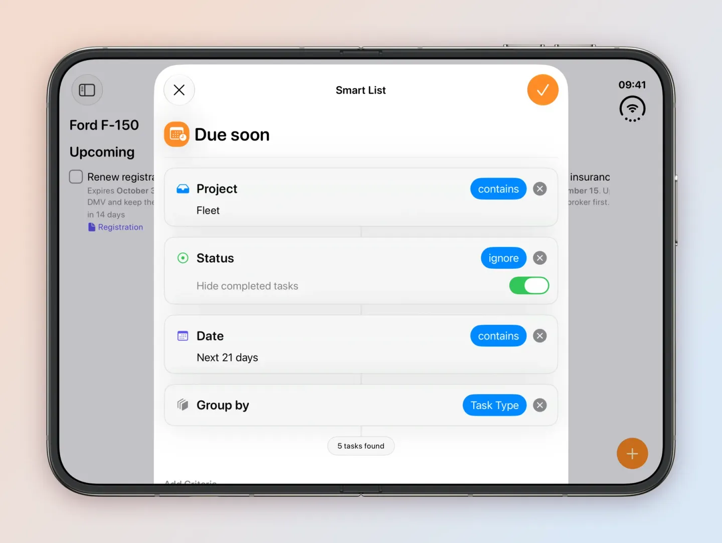 The Smart List editor for Due soon on an unfolded iPhone Duo: Project contains Fleet, Status set to ignore with Hide completed tasks on, Date contains Next 21 days, Group by Task Type, and 5 tasks found.