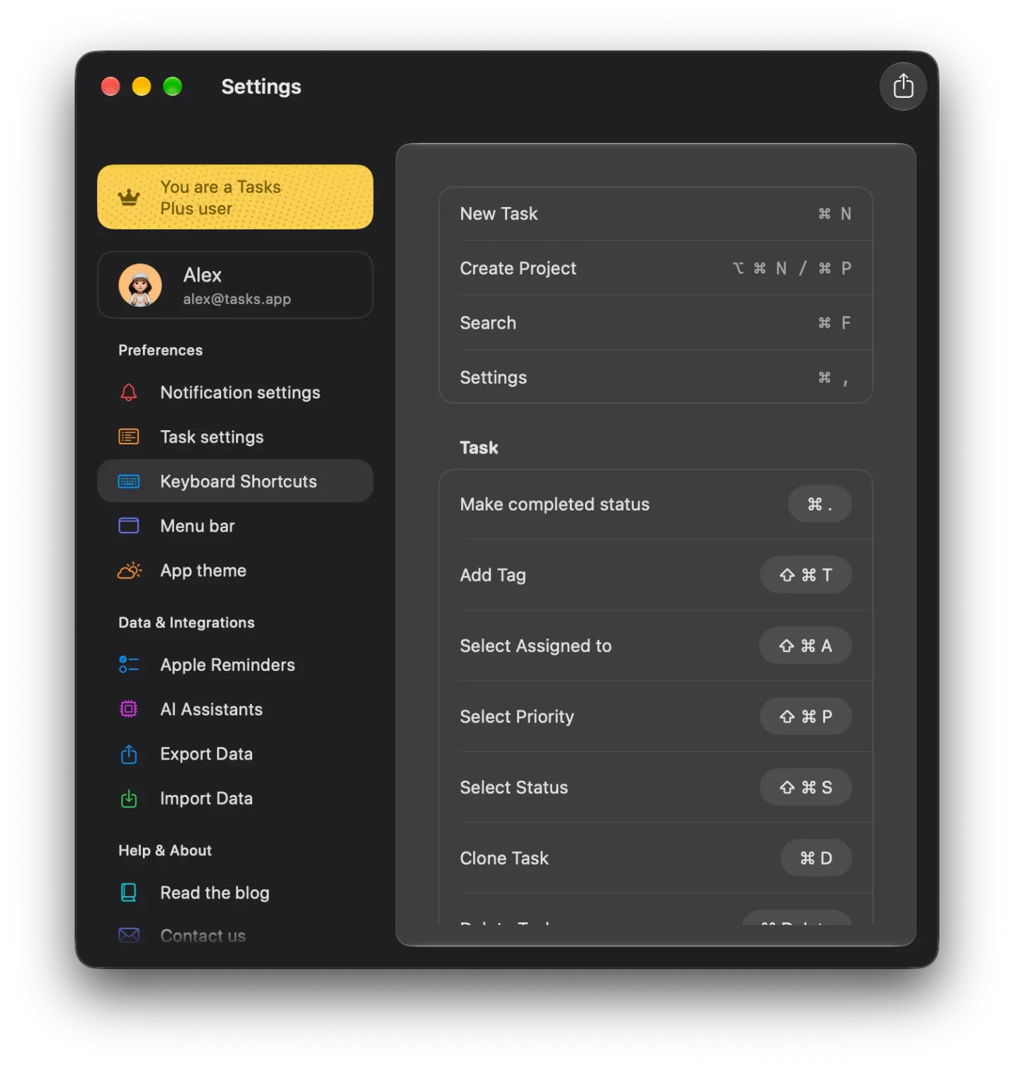The Tasks Settings window on Mac in dark mode with Keyboard Shortcuts selected, listing New Task ⌘N, Create Project ⌥⌘N or ⌘P, Search ⌘F and Settings ⌘ comma, then a Task section with Make completed status ⌘ full stop, Add Tag ⇧⌘T, Select Assigned to ⇧⌘A, Select Priority ⇧⌘P, Select Status ⇧⌘S and Clone Task ⌘D.