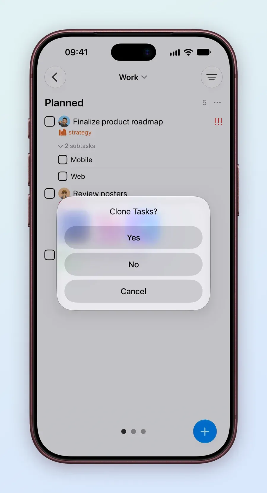 An iPhone screen of the Work board with the Clone Tasks? question and its Yes, No and Cancel buttons.
